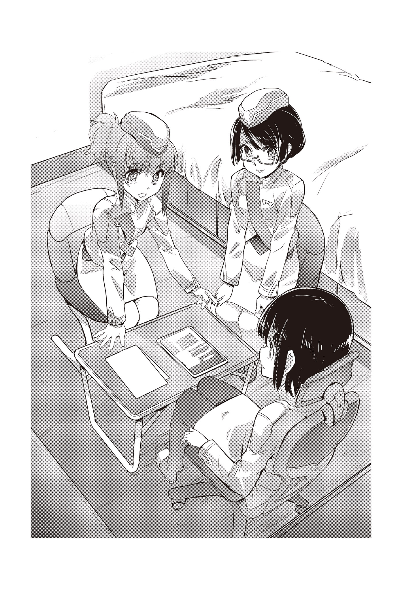 A group of people sitting at a table Description automatically generated